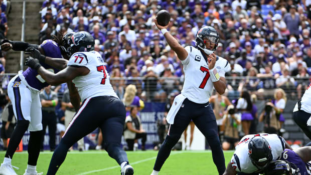 Texans quarterback C.J. Stroud (7) attempts a pass against the Baltimore Ravens during the first half at M&T Bank Stadium.